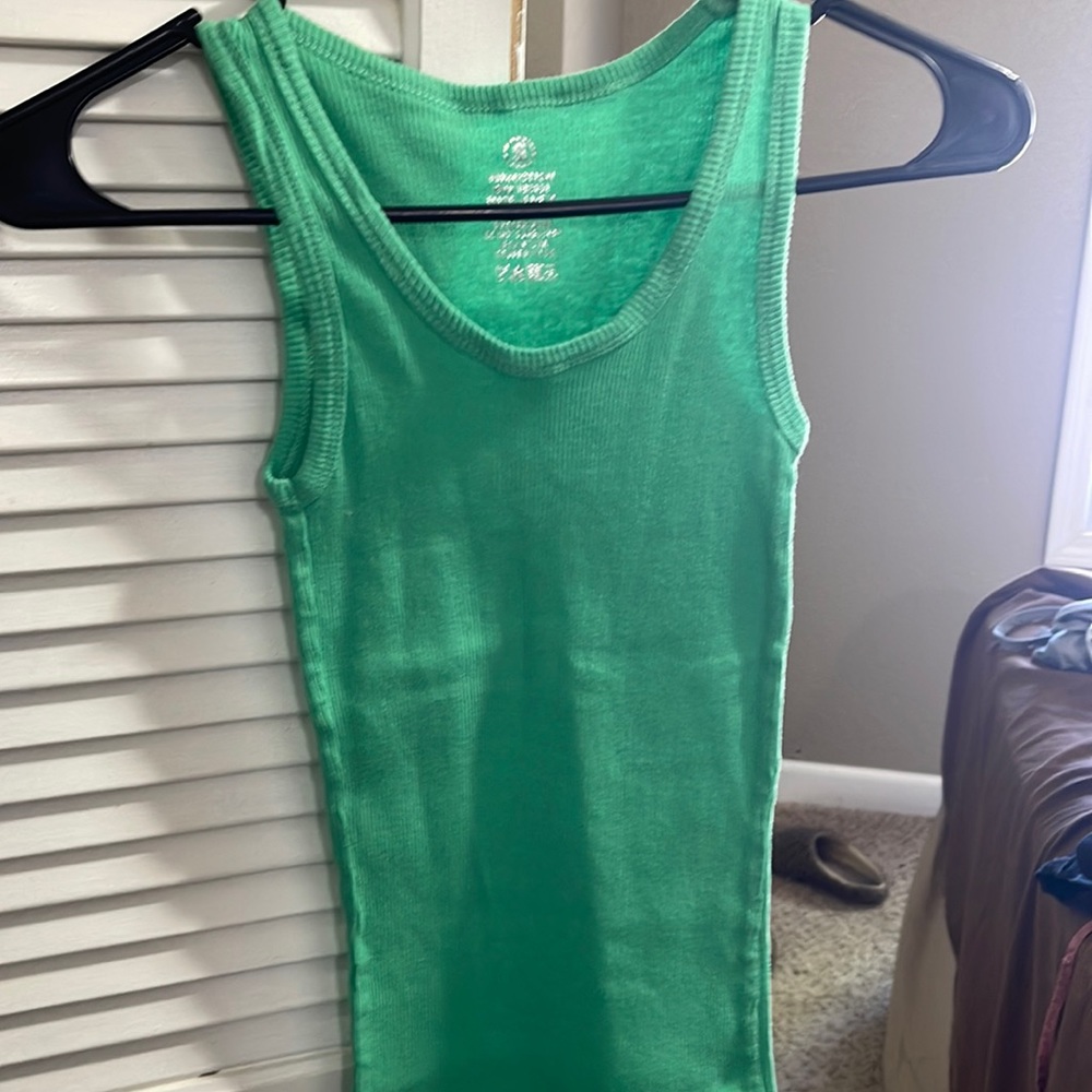 Light green muscle tank. Super super stretchy. Size small with no brand name.